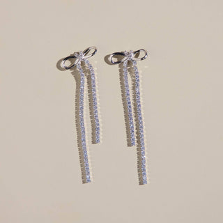 Silver Long Crystal Bow Drop Studs: Silver